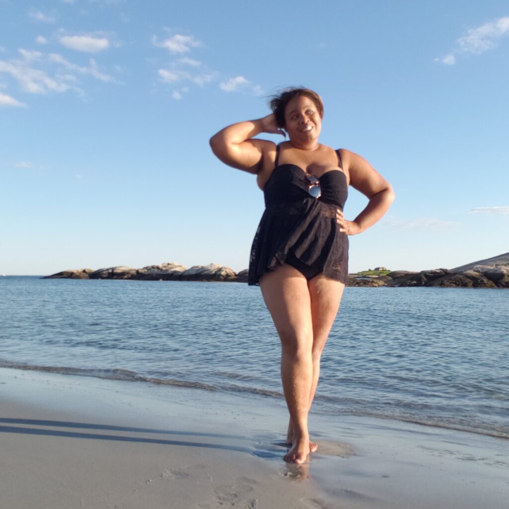 Shalese Heard (The Autistic Travel Goddess) on the beach