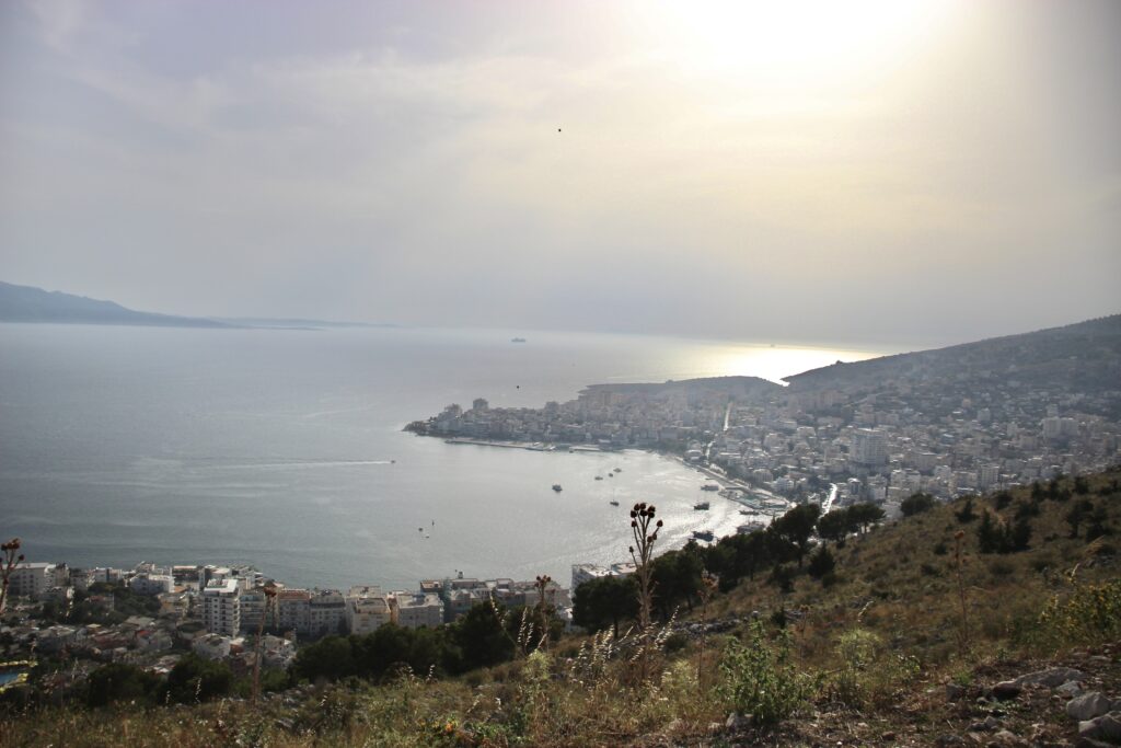 view of Sarandë during sunset from the Monastery of Forty Saints, autistic tourism
